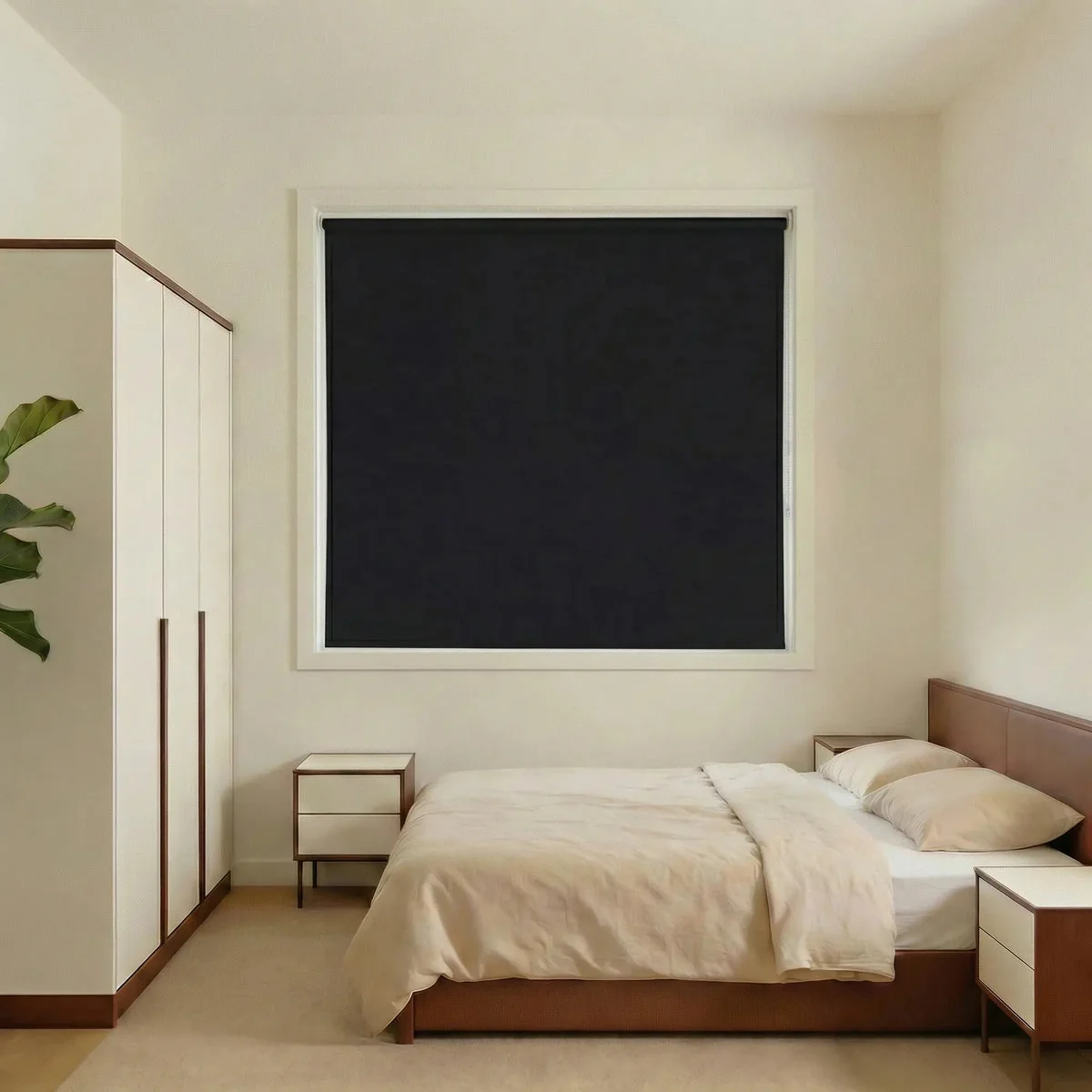 Charcoal blackout roller shade in a bedroom