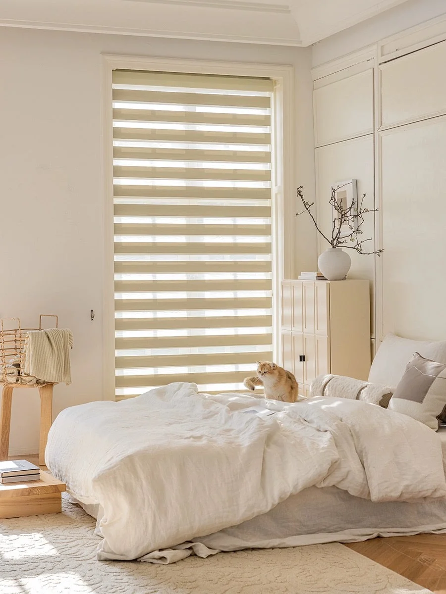 Cream zebra shades in a bedroom