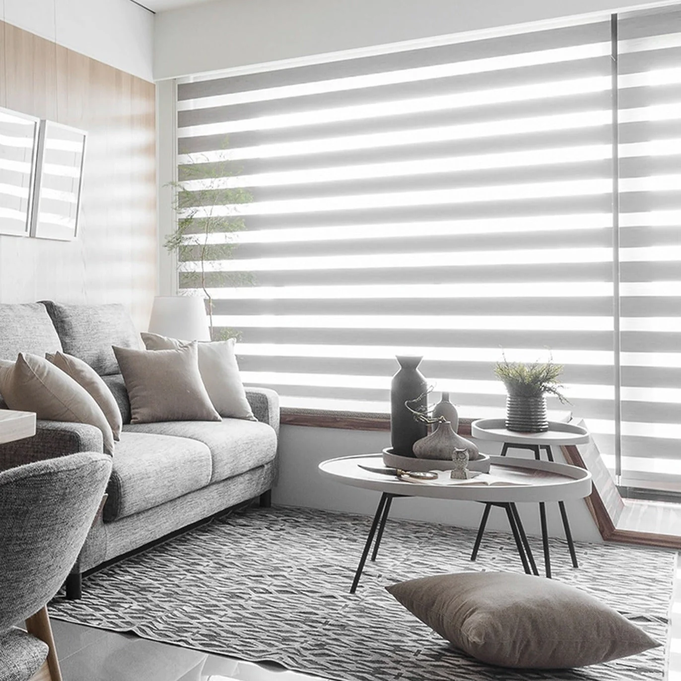 Grey wool-texture zebra shades in a living room