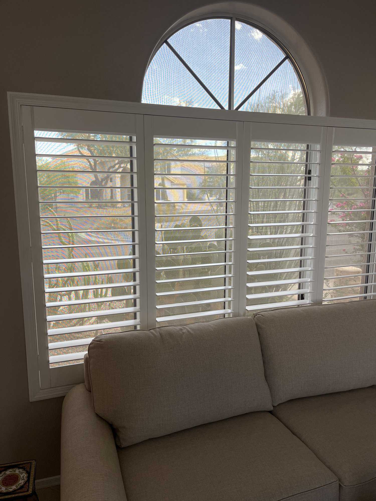 Custom arched hardwood shutters