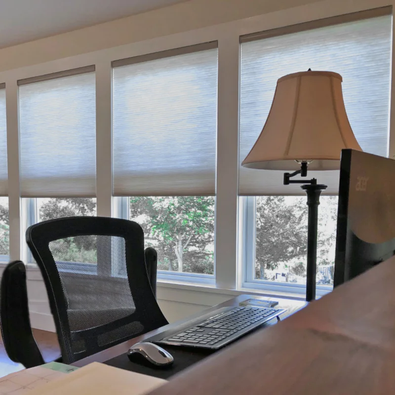 Light-filtering cellular shades in a home office