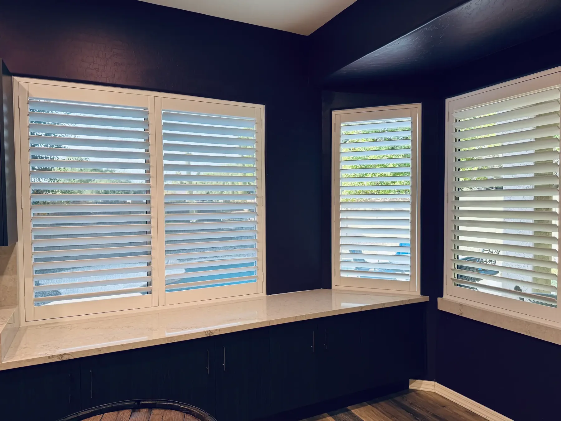 Pool view louver tilt, angled shutters that keep the view and cut afternoon glare