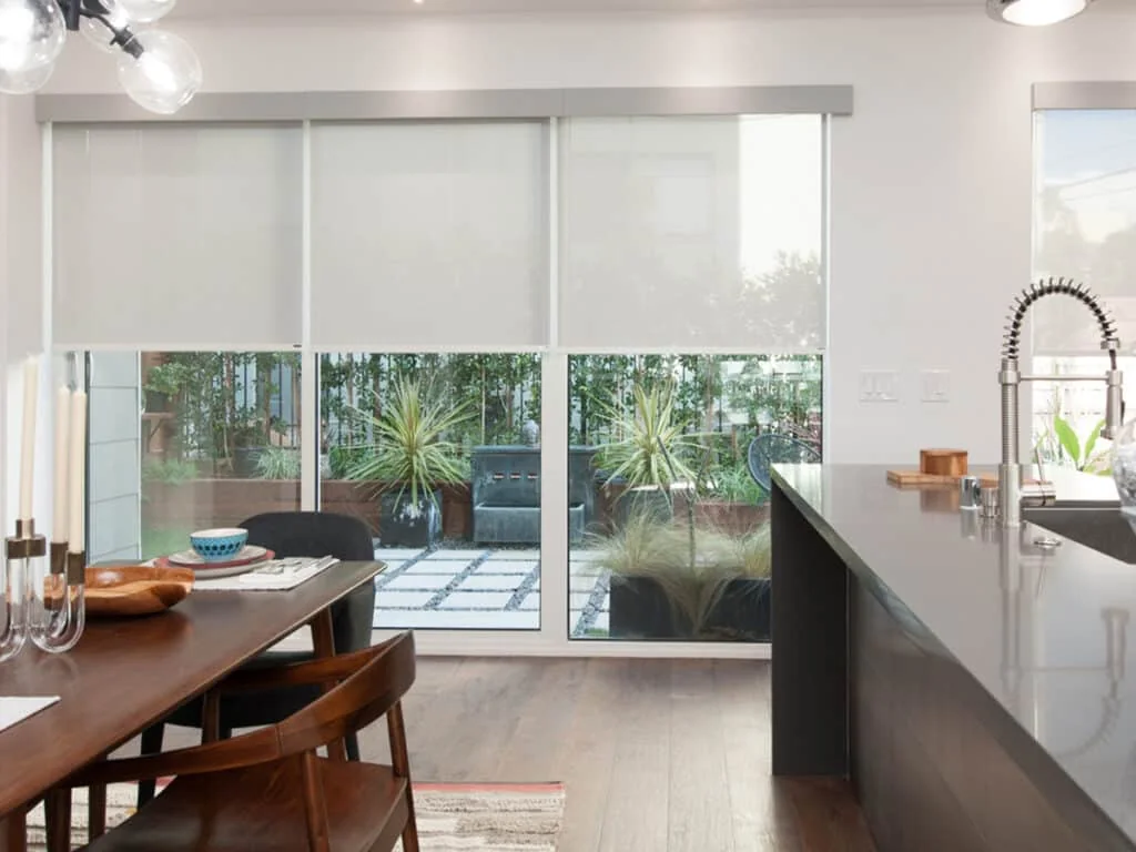 Roller shades on a kitchen patio sliding door